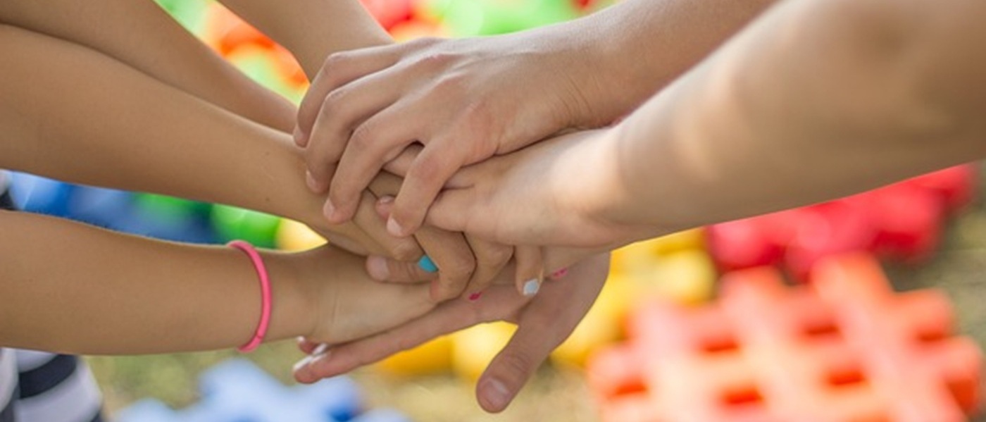 Hands holding coins